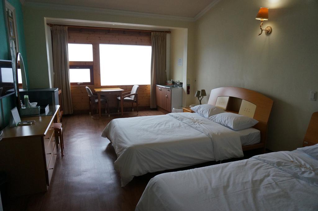 Park Beach Hotel Jeju Rum bild